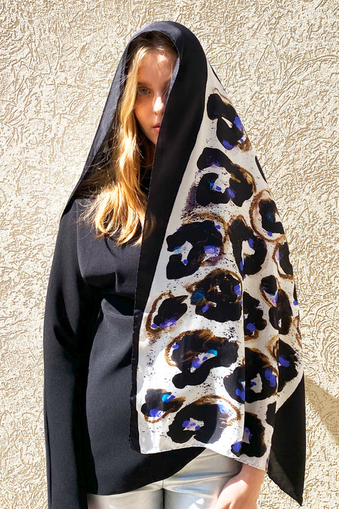 Black and white printed floral silk long scarf with electric blue touches. Abstract twill scarf by Dikla Levsky