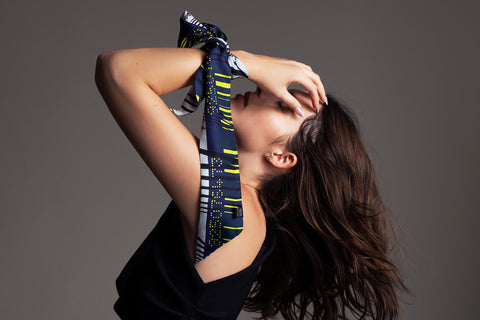 Printed mini silk scarf in a narrow shape and diagonal edges