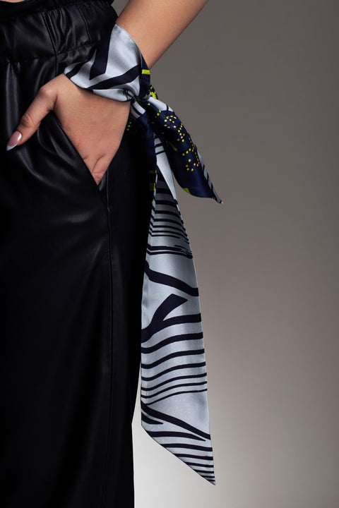 Printed mini silk scarf in a narrow shape and diagonal edges