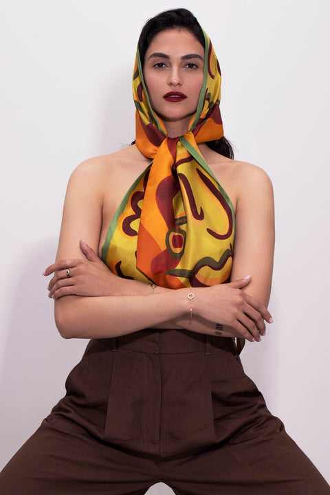 Printed silk scarf in vibrant colors and long shape with diagonal edges