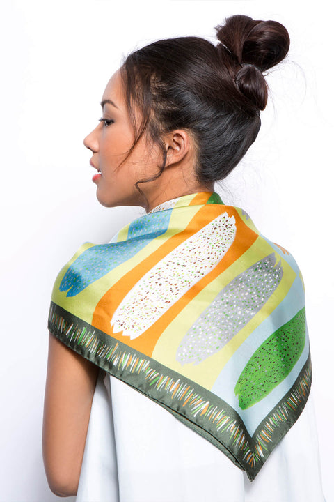 Ihlosi square silk scarf in green and ochre