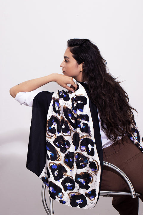 Black and white printed floral silk long scarf with electric blue touches. Abstract twill scarf by Dikla Levsky